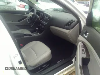 2015 Kia Optima EX with VIN 5XXGN4A71FG493648, listed as a IAAI auction lot 32483878 with Not provided miles and . Bid and sale history available at DreamBid. Image 5.