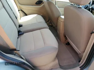 2006 Ford Escape XLS z VIN 1FMYU02Z36KB10195, wystawiony jako Copart lot #53108415 z przebiegiem Nie podano mil oraz Szkoda całkowita • Salvage title. Historia ofert i sprzedaży dostępna na DreamBid. Obrazek 12.