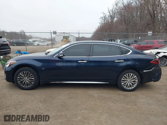 2015 Infiniti Q70 with VIN JN1BY1PRXFM832185, listed as a IAAI auction lot 41801058 with 101,503 mi miles and . Bid and sale history available at DreamBid. Image 14.