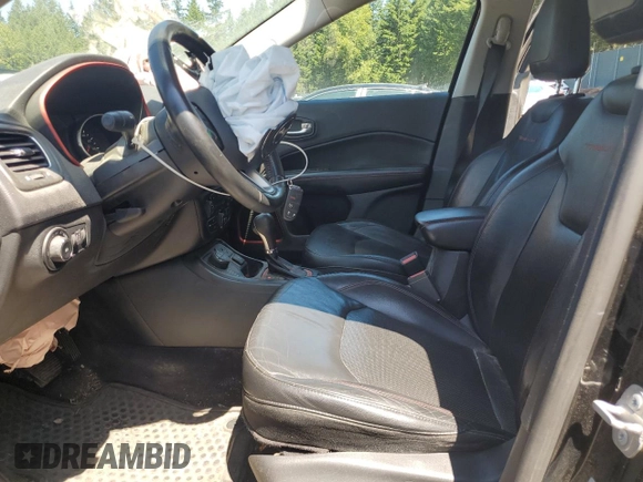 2017 Jeep Compass Trailhawk with VIN 3C4NJDDBXHT668053, listed as a Copart auction lot 63032155 with 94,090 mi miles and Salvage title. Bid and sale history available at DreamBid. Image 7.