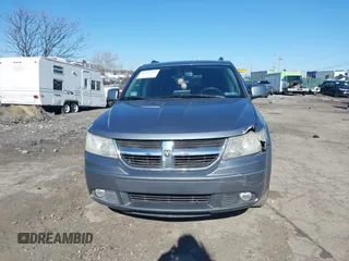 2010 Dodge Journey SXT with VIN 3D4PH5FVXAT107023, listed as a IAAI auction lot 41747572 with 165,568 mi miles and . Bid and sale history available at DreamBid. Image 11.