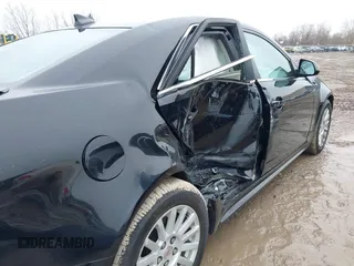 2012 Cadillac CTS with VIN 1G6DC5E54C0146550, listed as a IAAI auction lot 41735872 with 119,784 mi miles and . Bid and sale history available at DreamBid. Image 6.