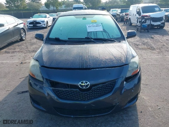 2010 Toyota Yaris with VIN JTDBT4K34A1377764, listed as a IAAI auction lot 41759405 with 154,226 mi miles. Bid and sale history available at carsss.com. Image 12.