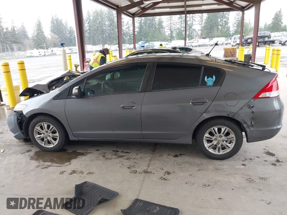 2010 Honda Insight EX with VIN JHMZE2H7XAS034098, listed as a IAAI auction lot 41939869 with 281,689 mi miles and . Bid and sale history available at DreamBid. Image 14.
