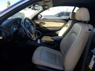 2010 BMW 1 Series 128i with VIN WBAUN1C56AVH82146, listed as a Copart auction lot 79296544 with 79,976 mi miles and Salvage title. Bid and sale history available at DreamBid. Image 7.