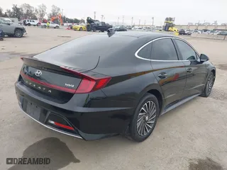 2021 Hyundai Sonata Hybrid SEL with VIN KMHL34JJ1MA024239, listed as a IAAI auction lot 41707290 with 165,214 mi miles. Bid and sale history available at carsss.com. Image 4.