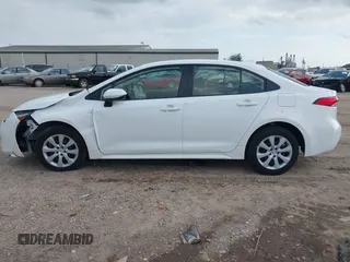 2024 Toyota Corolla Hybrid LE with VIN JTDBCMFE3R3048792, listed as a IAAI auction lot 41915869 with 22,899 mi miles. Bid and sale history available at carsss.com. Image 14.