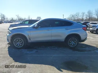 2018 BMW X6 xDrive35i with VIN 5UXKU2C50J0X51275, listed as a IAAI auction lot 41421704 with 165,052 mi miles. Bid and sale history available at carsss.com. Image 14.