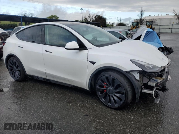 2022 Tesla Model Y Performance with VIN 7SAYGDEF3NF390848, listed as a Copart auction lot 49441025 with 42,488 mi miles and Salvage Title. Bid and sale history available at DreamBid. Image 4.