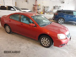 2009 Mitsubishi Galant ES z VIN 4A3AB36FX9E043141, wystawiony jako IAAI lot #42273376 z przebiegiem 242 378 mil mil oraz . Historia ofert i sprzedaży dostępna na DreamBid. Obrazek 1.