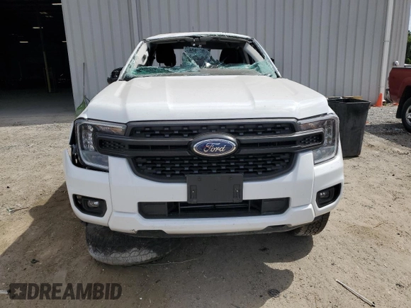 2024 Ford Ranger XL with VIN 1FTER4PH3RLE48663, listed as a Copart auction lot 55063265 with 10,666 mi miles and Salvage title. Bid and sale history available at DreamBid. Image 5.
