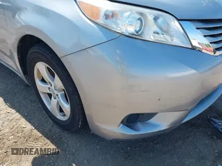 2015 Toyota Sienna LE AAS with VIN 5TDKK3DC5FS642583, listed as a IAAI auction lot 42110445 with 61,668 mi miles. Bid and sale history available at carsss.com. Image 6.