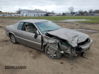 2000 Cadillac Eldorado with VIN 1G6EL12Y5YU166723, listed as a Copart auction lot 82612034 with 80,839 mi miles and Salvage title. Bid and sale history available at DreamBid. Image 4.