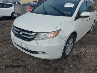 2017 Honda Odyssey EX-L with VIN 5FNRL5H62HB014449, listed as a IAAI auction lot 41736940 with 205,144 mi miles and . Bid and sale history available at DreamBid. Image 6.