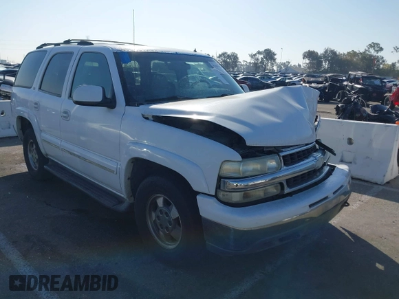 2002 Chevrolet Tahoe LS z VIN 1GNEC13TX2R240719, wystawiony jako IAAI lot #41616356 z przebiegiem 235 081 mil mil oraz . Historia ofert i sprzedaży dostępna na DreamBid. Obrazek 1.