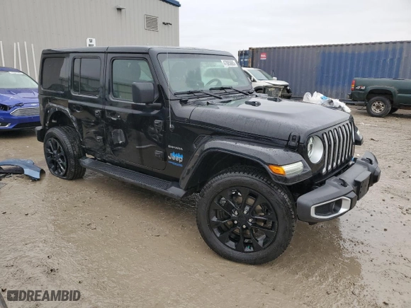 2021 Jeep Wrangler 4xe Unlimited Sahara with VIN 1C4JJXP68MW767277, listed as a Copart auction lot 47885665 with 53,869 mi miles and Salvage Title. Bid and sale history available at carsss.com. Image 4.