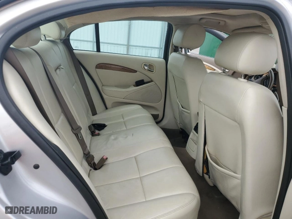 2006 Jaguar S-Type 3.0 with VIN SAJWA01A36FN54624, listed as a Copart auction lot 80041214 with 99,568 mi miles and Salvage Title. Bid and sale history available at carsss.com. Image 10.