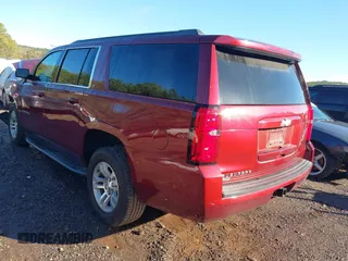 2017 Chevrolet Suburban LT with VIN 1GNSKHKC3HR311901, listed as a IAAI auction lot 40883429 with 141,325 mi miles. Bid and sale history available at carsss.com. Image 3.