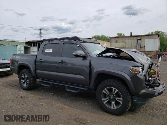 2019 Toyota Tacoma SR z VIN 3TMCZ5AN6KM283109, wystawiony jako Copart lot #58668905 z przebiegiem 44 923 mil mil oraz Szkoda całkowita • Salvage title. Historia ofert i sprzedaży dostępna na DreamBid. Obrazek 4.