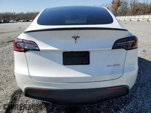 2023 Tesla Model Y Performance with VIN 7SAYGDEF4PF665873, listed as a Copart auction lot 49620705 with 39,239 mi miles and Salvage Title. Bid and sale history available at DreamBid. Image 6.