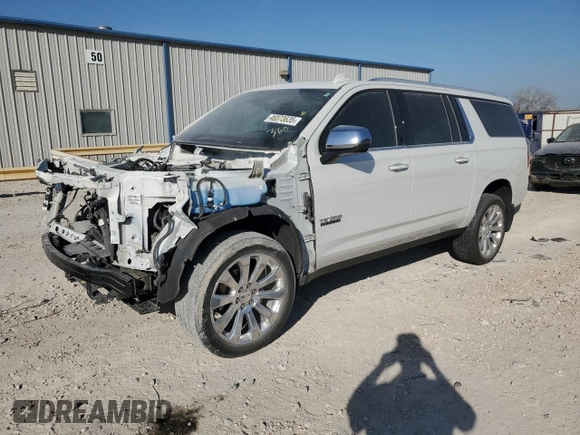 2023 Chevrolet Suburban Premier with VIN 1GNSCFKD2PR106790, listed as a Copart auction lot 46873635 with 31,972 mi miles and Salvage title. Bid and sale history available at DreamBid. Image 1.