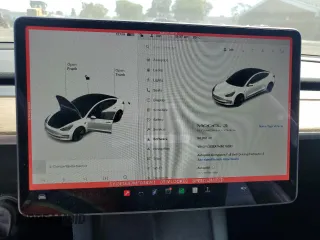 2021 Tesla Model 3 Standard Range Plus z VIN 5YJ3E1EA7MF078241, wystawiony jako Copart lot #57100525 z przebiegiem 56 700 mil mil oraz Szkoda całkowita • Salvage title. Historia ofert i sprzedaży dostępna na DreamBid. Obrazek 9.