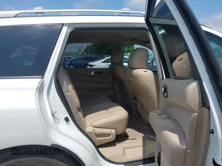 2015 Nissan Pathfinder S with VIN 5N1AR2MN2FC672785, listed as a IAAI auction lot 42535243 with 143,209 mi miles and . Bid and sale history available at DreamBid. Image 8.