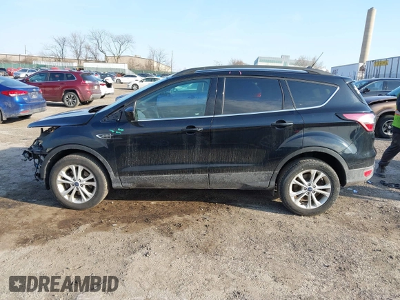 2018 Ford Escape SE z VIN 1FMCU9GD9JUC25456, wystawiony jako IAAI lot #41721436 z przebiegiem 55 642 mil mil oraz . Historia ofert i sprzedaży dostępna na DreamBid. Obrazek 15.
