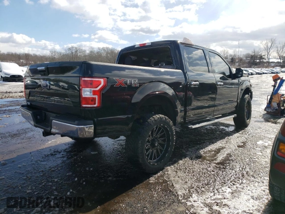 2018 Ford F-150 XL with VIN 1FTEW1E54JFB74361, listed as a Copart auction lot 45293295 with 153,456 mi miles and Salvage Title. Bid and sale history available at carsss.com. Image 3.