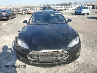 2014 Tesla Model S 60 с VIN 5YJSA1H16EFP40654, выставлен на аукционе Copart как лот 72070974 с пробегом Не указан миль и Списание • Salvage title. История ставок и продаж доступна на DreamBid. Изображение 5.
