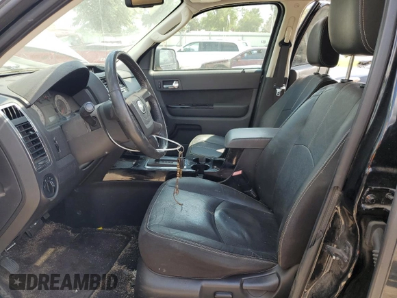2010 Mazda Tribute Grand Touring with VIN 4F2CY0C78AKM03177, listed as a Copart auction lot 66729164 with 75,400 mi miles and Salvage Title. Bid and sale history available at carsss.com. Image 7.