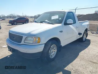 2001 Ford F-150 XL with VIN 2FTZF07221CA45965, listed as a IAAI auction lot 41621617 with 190,372 mi miles. Bid and sale history available at carsss.com. Image 2.