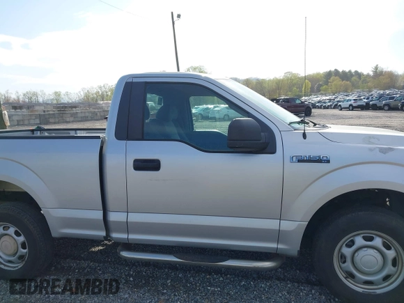 2015 Ford F-150 XL with VIN 1FTMF1C82FKD85016, listed as a IAAI auction lot 42019197 with 63,986 mi miles and . Bid and sale history available at DreamBid. Image 13.
