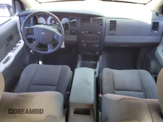 2005 Dodge Durango SXT with VIN 1D4HB38N65F614038, listed as a Copart auction lot 63580585 with 301,673 mi miles and Salvage title. Bid and sale history available at DreamBid. Image 8.