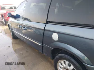 2001 Chrysler Town & Country with VIN 2C4GP54371R356559, listed as a IAAI auction lot 41731368 with 195,903 mi miles and . Bid and sale history available at DreamBid. Image 6.