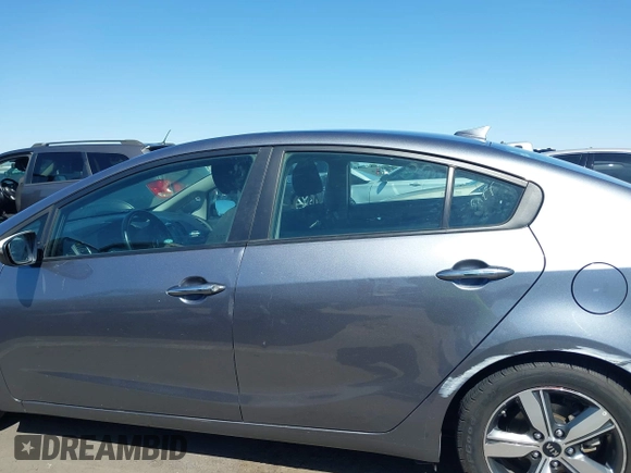 2018 Kia Forte LX with VIN 3KPFL4A77JE220538, listed as a IAAI auction lot 42095964 with 98,977 mi miles and . Bid and sale history available at DreamBid. Image 14.
