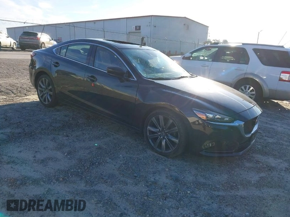 2018 Mazda Mazda6 Touring with VIN JM1GL1VM4J1307304, listed as a IAAI auction lot 41556563 with 173,739 mi miles. Bid and sale history available at carsss.com. Image 1.