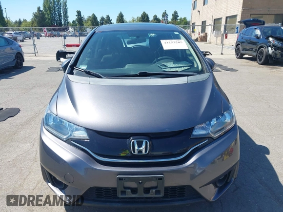 2015 Honda Fit EX-L z VIN 3HGGK5H86FM746265, wystawiony jako IAAI lot #42253205 z przebiegiem 75 491 mil mil oraz . Historia ofert i sprzedaży dostępna na DreamBid. Obrazek 12.