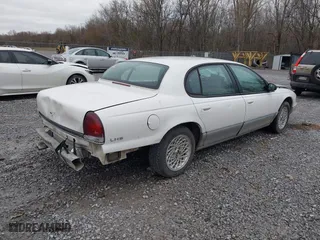 1997 Chrysler LHS with VIN 2C3HC56FXVH592484, listed as a IAAI auction lot 41667403 with 139,051 mi miles. Bid and sale history available at carsss.com. Image 4.