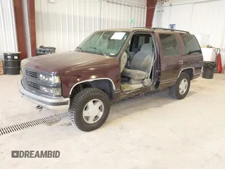 1996 Chevrolet Tahoe z VIN 1GNEK13R3TJ387858, wystawiony jako IAAI lot #41675147 z przebiegiem 196 811 mil mil oraz . Historia ofert i sprzedaży dostępna na DreamBid. Obrazek 2.