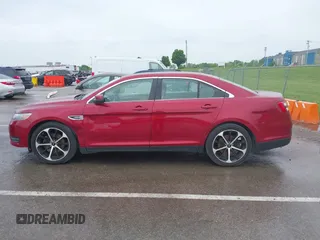 2014 Ford Taurus SEL z VIN 1FAHP2E83EG125622, wystawiony jako IAAI lot #42204238 z przebiegiem 134 032 mil mil oraz . Historia ofert i sprzedaży dostępna na DreamBid. Obrazek 15.