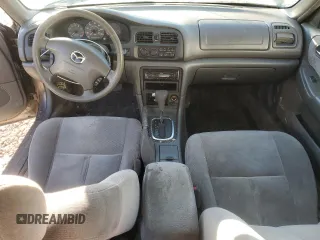 2000 Mazda 626 LX with VIN 1YVGF22D5Y5120152, listed as a Copart auction lot 44571595 with 177,624 mi miles and Salvage Title. Bid and sale history available at carsss.com. Image 8.