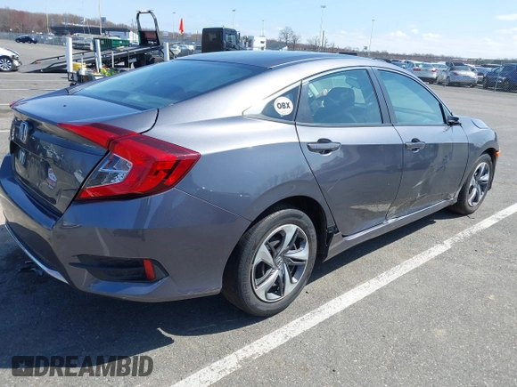 2020 Honda Civic Sedan LX with VIN 2HGFC2F66LH515272, listed as a IAAI auction lot 41946912 with 87,176 mi miles. Bid and sale history available at carsss.com. Image 4.