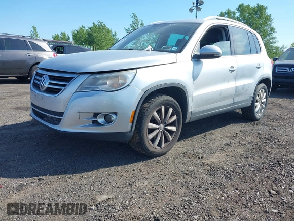2011 Volkswagen Tiguan SE with VIN WVGBV7AX4BW528845, listed as a IAAI auction lot 42248245 with 224,808 mi miles and . Bid and sale history available at DreamBid. Image 2.