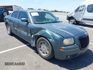 2005 Chrysler 300 Touring z VIN 2C3AA53G65H597685, wystawiony jako IAAI lot #42281352 z przebiegiem 152 967 mil mil oraz . Historia ofert i sprzedaży dostępna na DreamBid. Obrazek 1.