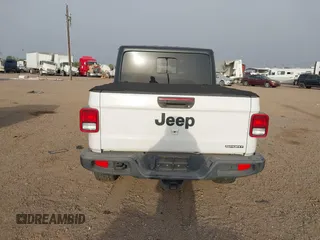 2020 Jeep Gladiator Sport S z VIN 1C6HJTAG5LL141251, wystawiony jako IAAI lot #41825062 z przebiegiem 51 961 mil mil oraz . Historia ofert i sprzedaży dostępna na DreamBid. Obrazek 16.