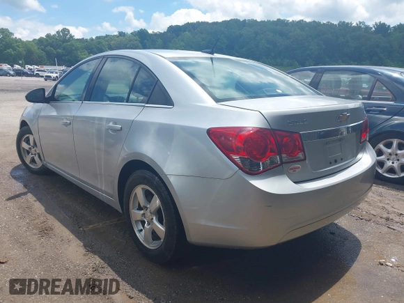 2014 Chevrolet Cruze 1LT z VIN 1G1PC5SB9E7349120, wystawiony jako IAAI lot #42273366 z przebiegiem 176 666 mil mil oraz . Historia ofert i sprzedaży dostępna na DreamBid. Obrazek 3.