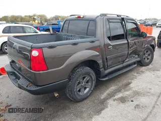2005 Ford Explorer Sport Trac XLS z VIN 1FMZU77K05UB13891, wystawiony jako IAAI lot #40859877 z przebiegiem 157 308 mil mil oraz . Historia ofert i sprzedaży dostępna na DreamBid. Obrazek 4.