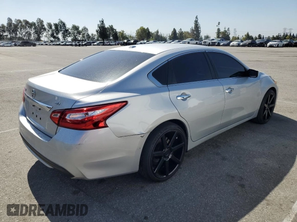 2017 Nissan Altima SL with VIN 1N4AL3APXHC232386, listed as a Copart auction lot 57254795 with 165,177 mi miles and Salvage title. Bid and sale history available at DreamBid. Image 3.