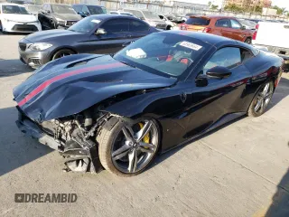 2020 Ferrari Portofino z VIN ZFF89FPA7L0256197, wystawiony jako Copart lot #65969664 z przebiegiem Nie podano mil oraz Szkody całkowita. Historia ofert i sprzedaży dostępna na DreamBid. Obrazek 1.